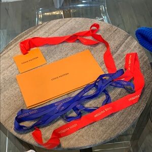 Louis Vuitton Orange Envelope with Blue and Red Ribbons
